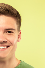 Image showing Caucasian young man\'s close up shot on green background