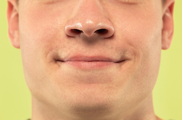 Image showing Caucasian young man\'s close up shot on green background