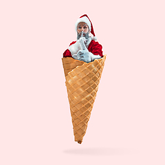 Image showing Happy Christmas Santa Claus on coral studio background