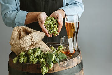 Image showing Close up of confident senior man brewer with self crafted beer