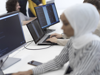 Image showing african muslim business woman at office as part of creative team