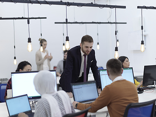 Image showing creative business people group as freelancers in modern coworking open space office