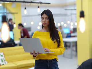 Image showing young business at work in creative modern coworking startup open space office