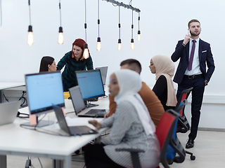 Image showing creative business people group as freelancers in modern coworking open space office