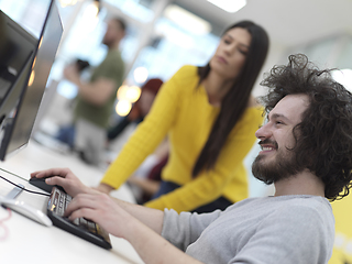 Image showing creative business people group as freelancers in modern coworking open space office