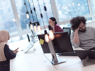 Image showing business team working together on project at modern office