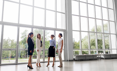 Image showing businesswomen meeting at office and talking