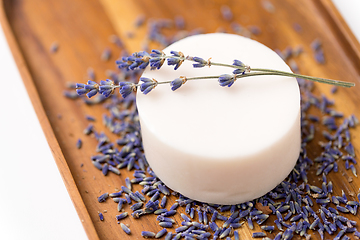 Image showing close up of crafted lavender soap on wooden tray