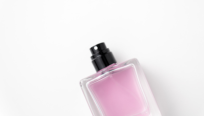 Image showing bottle of perfume or pink toilette water