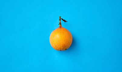 Image showing ripe granadilla on blue background