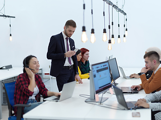 Image showing creative business people group as freelancers in modern coworking open space office