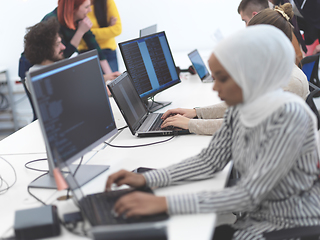 Image showing african muslim business woman at office as part of creative team