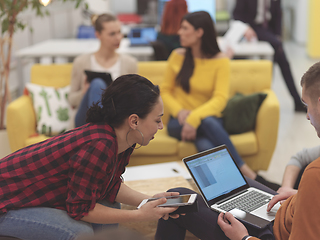 Image showing team meeting and brainstorming in modern office