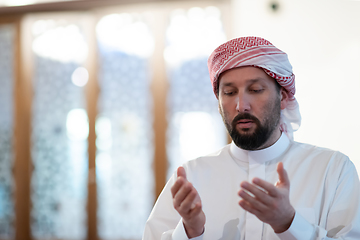 Image showing muslim prayer inside the mosque in namaz worship Allah