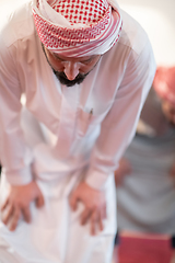 Image showing group of muslim people praying namaz in mosque.