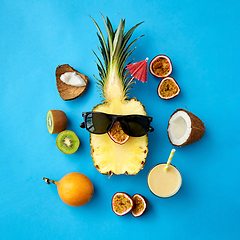 Image showing pineapple in sunglasses with other exotic fruits