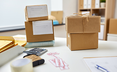 Image showing parcel boxes on table at post office