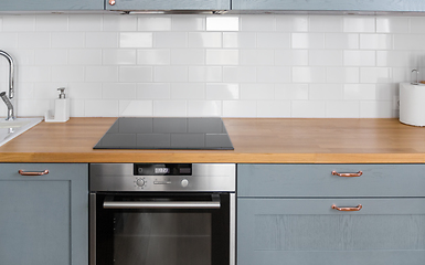 Image showing modern home kitchen interior with oven and hob