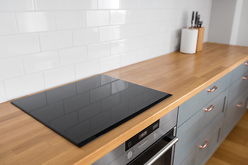 Image showing modern home kitchen interior with oven and hob