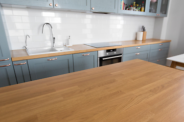 Image showing home kitchen interior with counter and table