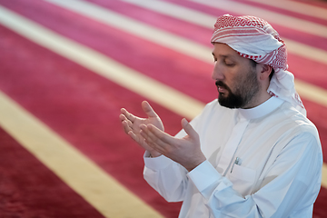 Image showing muslim prayer inside the mosque in namaz worship Allah