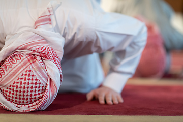 Image showing group of muslim people praying namaz in mosque.