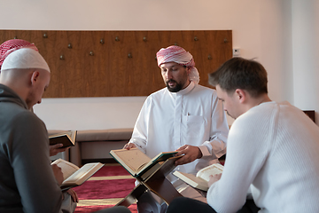 Image showing muslim people in mosque reading quran together