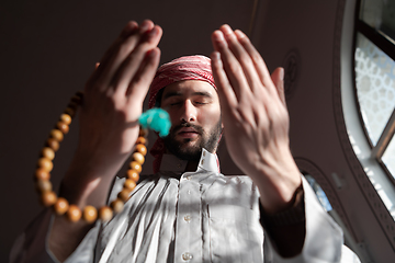 Image showing muslim prayer inside the mosque in namaz worship Allah