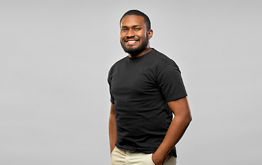 Image showing smiling african american man in black t-shirt