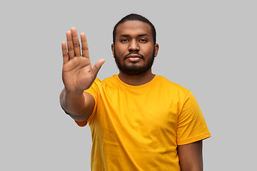 Image showing african american man showing stop gesture