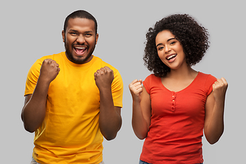 Image showing happy african american couple celebrating success