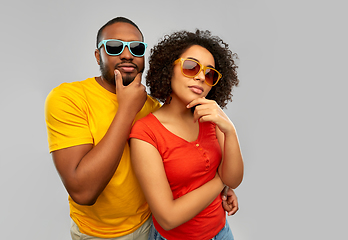 Image showing african couple in sunglasses thinking