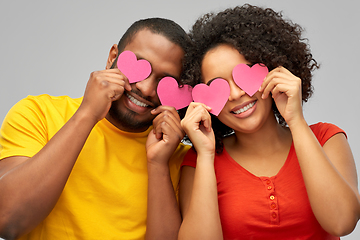 Image showing happy african american couple with hearts