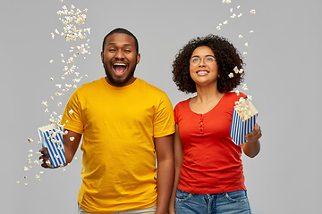 Image showing happy african american couple with popcorn