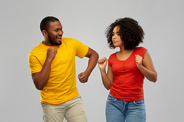 Image showing happy smiling african american couple dancing