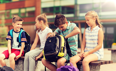 Image showing group of elementary school students with backpacks