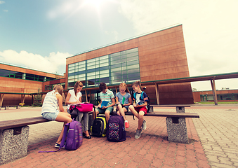 Image showing group of happy elementary school students outdoors