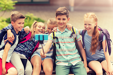 Image showing happy elementary school students taking selfie