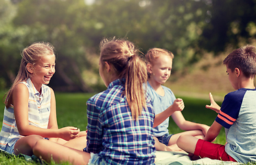 Image showing happy kids playing rock-paper-scissors game