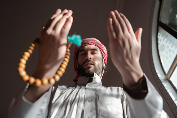 Image showing muslim prayer inside the mosque in namaz worship Allah