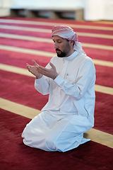 Image showing muslim prayer inside the mosque in namaz worship Allah