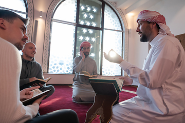 Image showing muslim people in mosque reading quran together