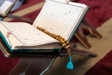 Image showing The holy book of the Koran on the stand