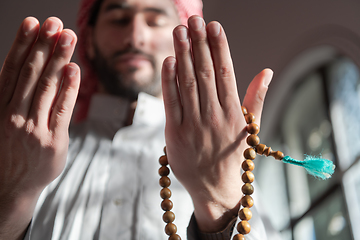 Image showing muslim prayer inside the mosque in namaz worship Allah