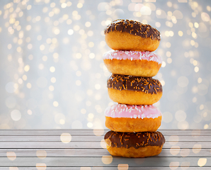 Image showing close up of glazed donuts with sprinkles