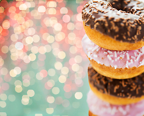 Image showing close up of glazed donuts with sprinkles