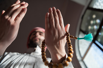 Image showing muslim prayer inside the mosque in namaz worship Allah