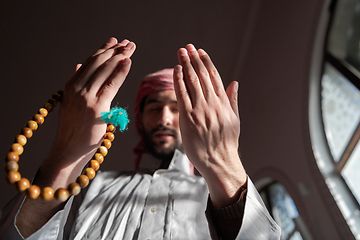 Image showing muslim prayer inside the mosque in namaz worship Allah