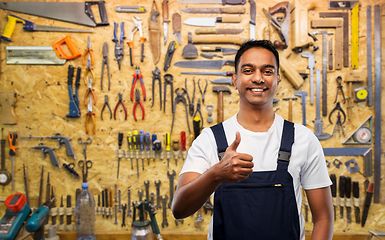 Image showing happy indian worker or builder showing thumbs up