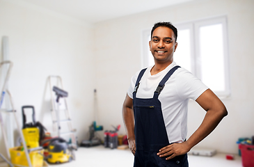 Image showing happy smiling indian worker or builder